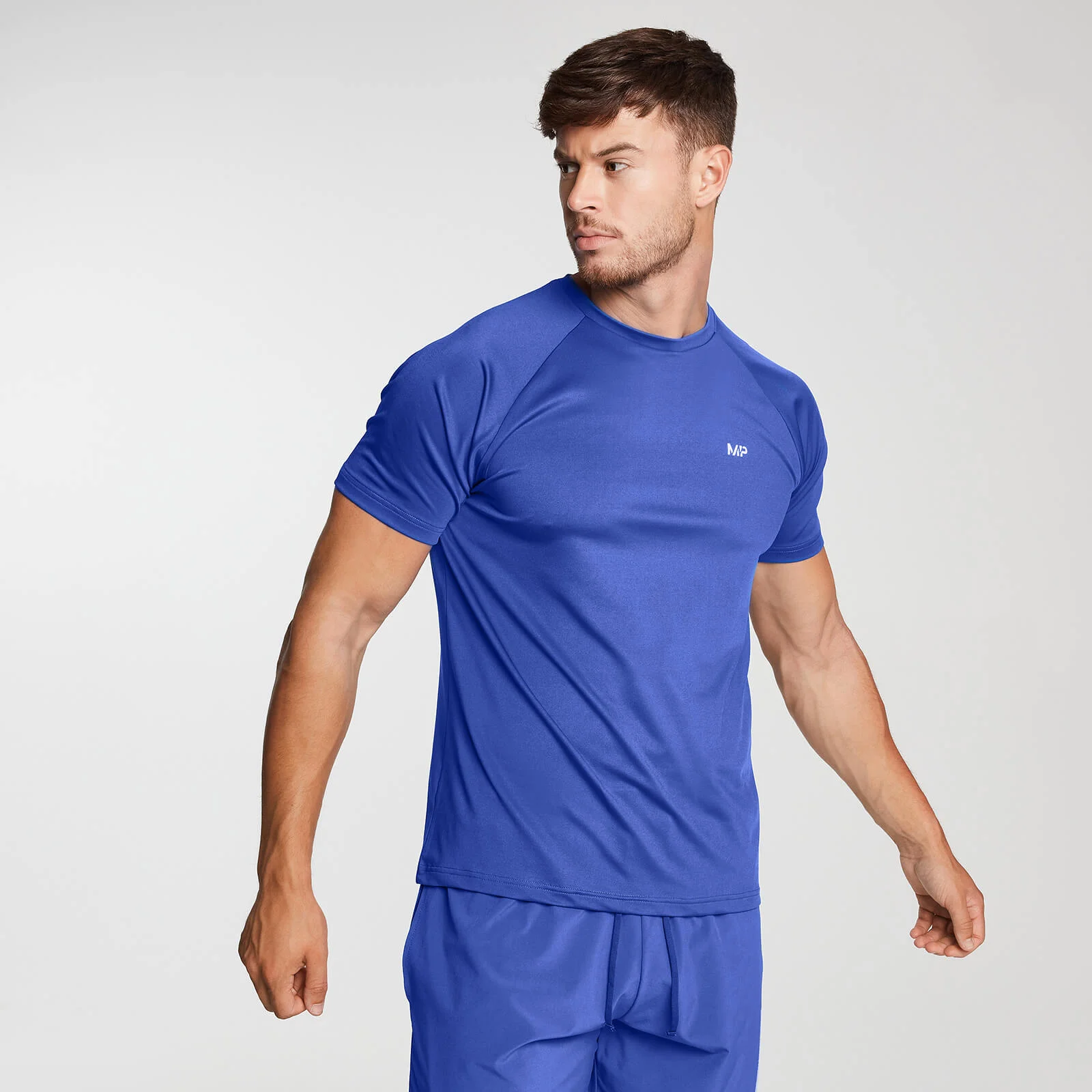 Спортивная футболка с принтом - XS Изображение 1